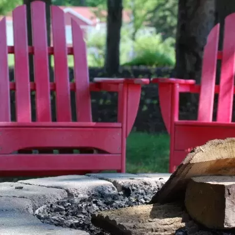 Chairs by outdoor fire pit