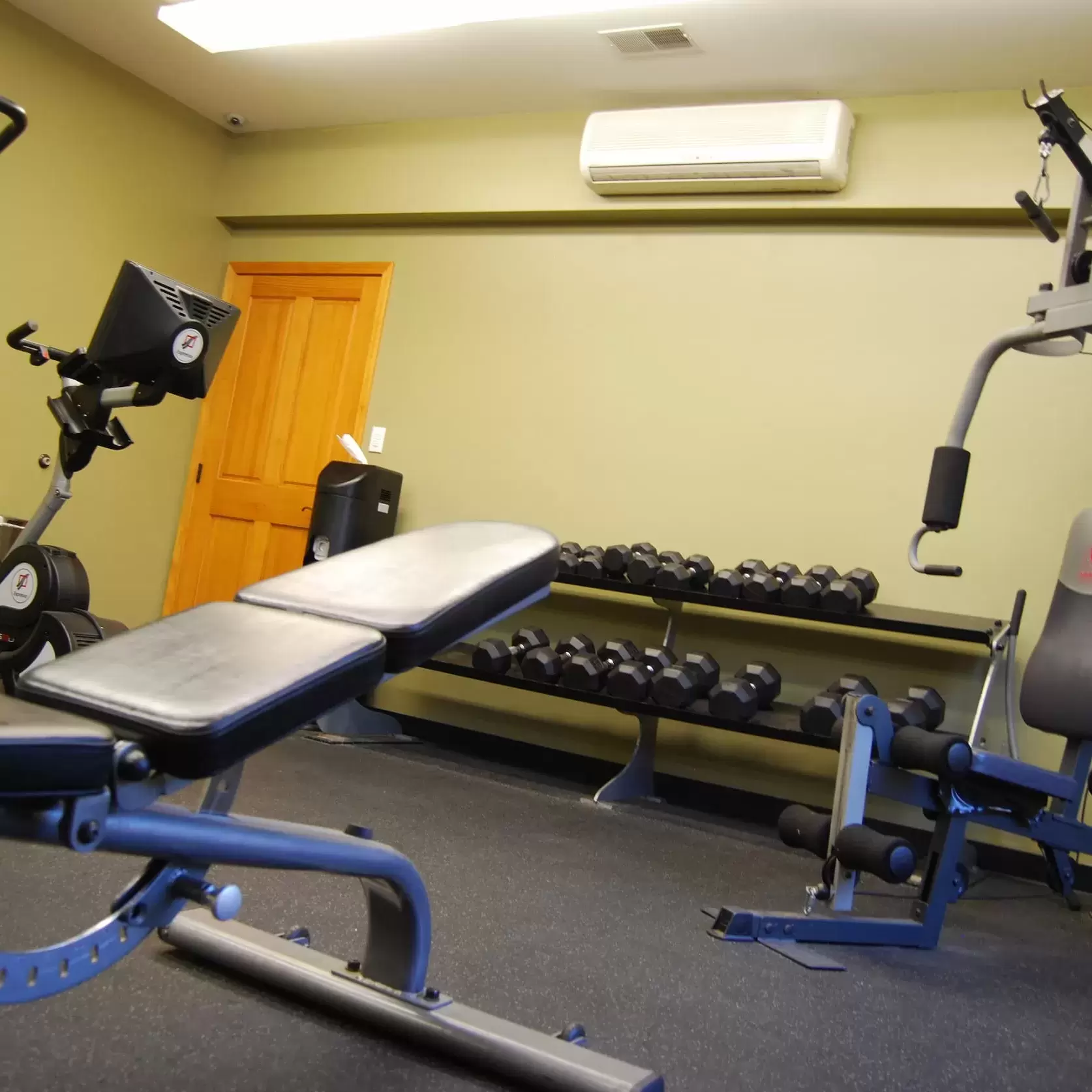 Equipment in the fitness center at Liv Wildwood Apartments