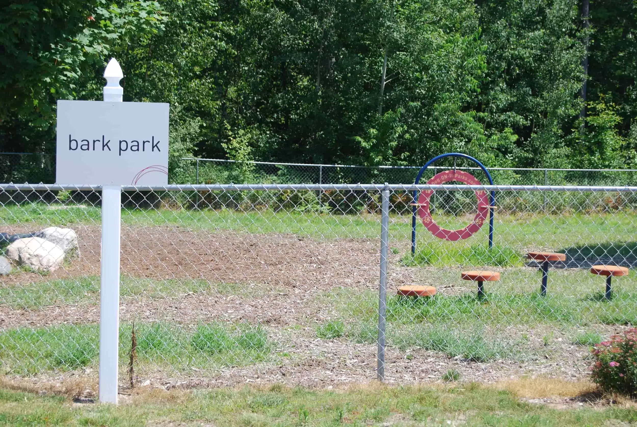 The Bark Park outdoor play area for dogs has fun agility obstacles.
